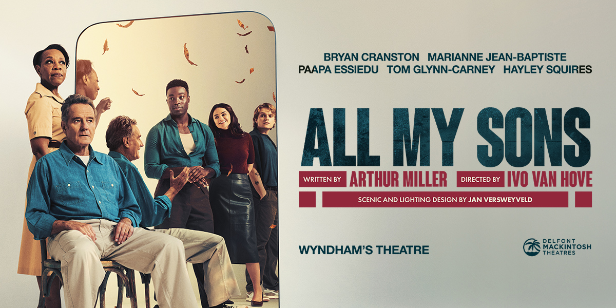 A modern mirror with a sleek frame reflects a bright, minimalist room with neutral tones.