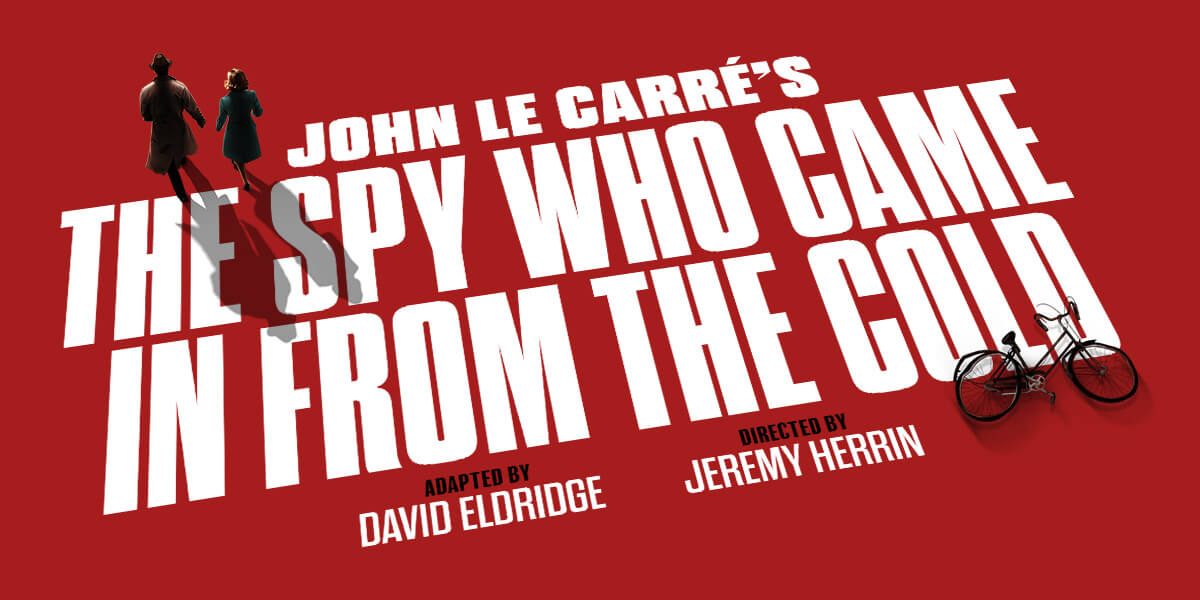 A close-up of ticket agent buttons featuring various symbols on a textured background, predominantly in dark colours.